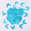Combina y mezcla varias formas de rellenos de confeti para globos para crear un ambiente de fiesta y decorar el salón de bodas con purpurina.