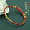 Sencilla nueva cuerda de mano tejida a mano para mujer nudo de diamante geométrico Festival del Bote Dragón cuerda roja pulsera de cuerda colorida al por mayor
