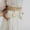 Populares alzapaños de cortina minimalistas europeos y americanos transfronterizos con anillos de resorte de estrella y luna, alzapaños de cortina sin taladro al por mayor