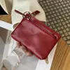 Bolsa para monedas para mujer, pequeña y linda, nuevo modelo 2026, llavero con cremallera de cuero genuino, billetera pequeña multifuncional de mano