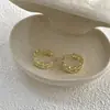 Brincos Redondos Vazados Interligados Banhados a Ouro Real Estilo Cool Transfronteiriço Brincos Personalizados Brincos de Luxo Leve com Temperamento de Ponta