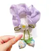 Goma para el pelo con colgante de flor de fresa estilo coreano, un accesorio para el cabello alegre y dulce para que los niños recojan su cabello en un moño