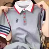 Camiseta de Botones Bordada a Rayas de Manga Corta Talla Plus para Mujer, Nuevo Estilo Primavera/Verano, Corte Holgado, Versátil, Adelgazante, Top de Moda para Mujer