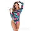 Maiô feminino de manga comprida para surfe, modelo Cross-Border Swimwear, com estampa europeia e americana, disponível para atacado.