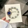 Regalo cultural y creativo pulsera de reloj con cuentas de imitación de cristal ovaladas ajuste libre tipo cordón reloj de cuarzo para mujer pequeño a la moda
