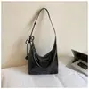 Bolso retro para mujer Shuai Mi Jia 2026 verano nuevo color liso bandolera de un solo hombro bolso de axila bolso de mano casual para commuting para mujer