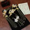 Traje de tocado Hanfu Pinza de pelo con borla de niña súper hada Paso a paso para peinar el pelo Pinza de pelo Accesorios para el pelo de ropa antigua Pinza de pelo antigua para niños