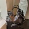 Bolso grande de moda retro para mujer 2026 nuevo bolso casual simple para el antebrazo bolso tote de hombro texturizado para el trabajo