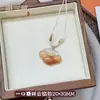 Colgante de ágata natural "Hebilla de la Paz" con orejas de gato, amuleto de calcedonia "Sin Preocupaciones", colgante de Buda y flor de loto