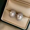 2026 Novo Estilo Brincos de Tarraxa Ovais com Zircônia e Pérola Moda Versátil Nicho Brincos Joia para Orelha de Luxo Leve Alto Padrão para Mulheres