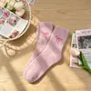 Calcetines de felpa hasta la pantorrilla con jacquard de lazo, suaves y amigables con la piel, adecuados para el uso diario, lindos y modernos para niñas