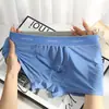 Ropa interior de seda helada para hombre, verano, súper tecnología negra, masaje, cómoda, malla transpirable, deportiva, boxers de cuatro puntas para hombre