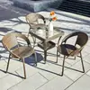 Juego de tres sillas de mimbre, incluyendo una pequeña mesa y sillas de balcón, una mesita de té pequeña, una mesa de té de ocio para patio exterior minimalista, resistente al agua y al sol, un diseño popular