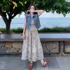 Moda Casual Juvenil Adelgazante Elegante Chaleco de Mezclilla con Adorno de Diamantes + Conjunto de Falda con Tirantes Verano 2026