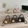 Bolso Boston de color de bloque de lunares de nicho transfronterizo para mujer, nuevo bolso de hombro y cruzado informal con textura para el verano de 2026
