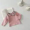 INS primavera y otoño bebé floral cuello de muñeca manga larga camiseta interior bebé niña estilo occidental top de punto