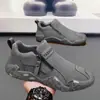 Sapatos masculinos 2026 novo outono respiráveis casuais para trabalho em canteiros de obras, trilhas ao ar livre, roupas de trabalho, botas Martin da moda
