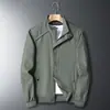 Chaqueta de trabajo de color liso con cuello de solapa para primavera y otoño para hombre, holgada, casual, versátil, moderna, simple y elegante, prenda exterior
