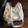 Bolsa Casual Sencilla de Gran Capacidad para Mujer 2026 Nuevo Estilo de Verano Bolso de Hombro Versátil para el Trabajo y los Viajes Mochila Multifuncional para Exteriores
