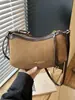 Bolso de mano pequeño de alta gama para mujer, nuevo bolso cruzado versátil de moda 2026, bolso de hombro popular de venta caliente, bolso tipo silla de montar súper moderno