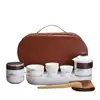 Juego de té de porcelana blanca Dehua con tetera y cuatro tazas, portátil para uso en exteriores, un regalo lujoso y de alta gama