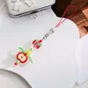 Nuevo y creativo colgante para teléfono y llavero de colores con lazo, corazón y estrella, exquisito para niñas, adecuado para colgar en mochilas