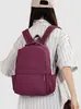 Mochila casual para hombres y mujeres, mochila impermeable de color liso, mochila escolar ligera de gran capacidad para estudiantes, mochila elegante para mujeres
