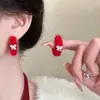 Pendientes de bola de pelo color curry retro otoño e invierno diseño de nicho pendientes de felpa de alta calidad joyería para orejas Joker venta al por mayor