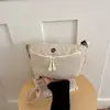 Bolso bandolera de color liso al por mayor transfronterizo, bolso de hombro simple y moderno de moda, bolso de hombro casual impermeable y resistente al desgaste para viajes