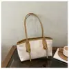 Bolso de hombro de moda transfronterizo para mujer 2026, nuevo bolso tote vintage de moda, con textura, casual, versátil