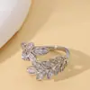 Moda Exquisita y Simple de Amazon Transfronteriza Anillo Abierto Ajustable Forma de Oreja Completamente Incrustado con Circonita Diamante Joyería de Alta Gama