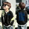 Camiseta de manga larga de punto gofre para niños, nuevo estilo primavera y otoño 2026, suéter para bebé, camiseta de dos en uno de moda para niños mayores