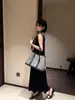 Nuevo conjunto de falda larga tipo cola de pez de terciopelo estilo coreano de Lino para mujer 2026, moderno y elegante, holgado y adelgazante