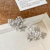 Pendientes de Botón con Lazo de Perla Brillante y Circonita Estilo Francés Personalidad Elegante Temperamento Diseño de Nicho Pendientes Versátiles de Lujo Ligero