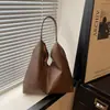 Bolsa tote de grande capacidade 2026 verão nova versão coreana estilo minimalista feminina cor sólida artística casual retrô bolsa de ombro