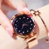 TikTok spot venta al por mayor reloj de cuarzo estrellado para mujer reloj perezoso correa magnética reloj magnético