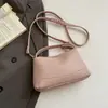 Bolso de mano de alta costura estilo coreano, bolso de hombro, nuevo modelo primavera 2026, bolso tipo almohada casual simple, bolso cruzado de nicho para mujer