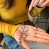 Colar Longo de Metal em Formato de Coração para Mulheres 2025 Novo Design de Nicho Feminino Simples Ins Corrente de Clavícula de Alta Qualidade