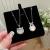 Collar Colgante de Gato con Circonita Redonda y Calcedonia Transfronterizo Europeo y Americano con un Diseño Único, Cadena de Clavícula de Nicho, Accesorio Versátil y Elegante