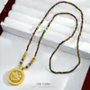 Brújula de los Ocho Tesoros Piedra Ojo de Tigre Colgante de Latón Chapado en Oro con Diamantes, Diseño Hueco Giratorio, Cadena Versátil para Suéter Estilo Chino Nuevo