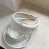 Diadema vintage de lunares plisada de ala ancha para mujer, casual y única, con un toque de alta gama, diadema versátil que hace que la cabeza se vea más alta y el rostro parezca más pequeño