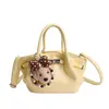 Bolso Cubo Popular de Nicho Transfronterizo para Mujer 2026 Nueva Moda Elegante Bolso de Hombro Súper Moderno Bolso Cruzado de Cuero Aceitoso