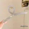 Elegante pinza de tiburón estilo coreano, pinza para el pelo mate versátil 2026, pinza de cangrejo simple y elegante de color café