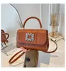 Bolso bandolera pequeño cuadrado de color liso, simple y moderno, estilo coreano, para primavera-verano 2026, nuevo, casual, para ir al trabajo, con cadena y pedrería brillante