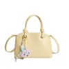 Bolsa Pequena Quadrada Texturizada Estilo Japonês e Coreano para Mulheres 2026 Nova Bolsa de Ombro Transversal de Nicho Estilo Creme Bolsa Feminina Fofa