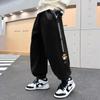 Calça Esportiva Infantil Masculina Primavera e Outono 2025 Nova Roupa Infantil Bonita Larga Casual Calça para Menino Grande Outono Calça de Moletom