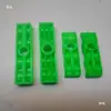 Clip de línea de remolque de cuatro agujeros clip de manguera de aire clip de tres agujeros clip de fijación de cable de camión PVC verde 12mm clip de tubería de remolque