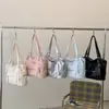 Bolsa de mano retro americana transfronteriza para motocicleta para mujer, primavera 2026, gran capacidad, bolso casual de hombro y axila a la moda, moderno