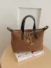 Bolso de mano de lona a rayas azul denim, bolso simple y versátil, bolso de hombro para mujer, bolso cruzado de moda de alta gama