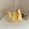 Bolso de moda coreano de moda para mujer, nuevo modelo otoño 2026, bolso de hombro casual de gran capacidad, elegante bolso tote para commuting